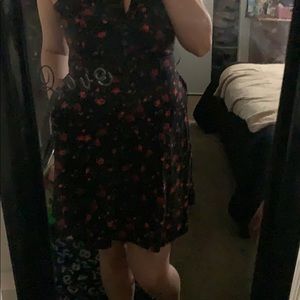 Black dress with red rose